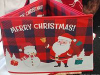 Folded panel showing Santa, snowman, Merry Christmas text