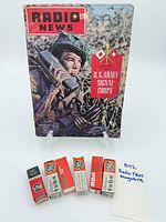 Magazine front cover and six boxed vacuum tubes