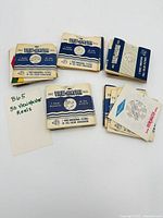 Grouped view of reels showing paper sleeves and count card