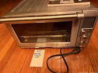 Front view of Breville Smart Oven with power cord visible