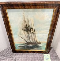 Front view of framed sailing ship print