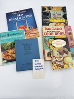 Group shot showing six vintage cookbooks