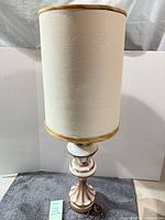 Full view of lamp with shade showing overall style and height