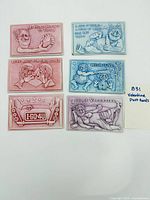 Front view of all six postcards laid out