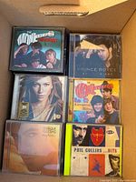 Box showing six CD jewel cases