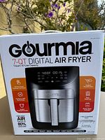 Front of retail box showing Gourmia 7-QT Digital Air Fryer image and specs