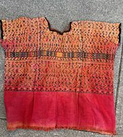 Front view of huipil showing full design