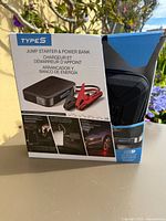 Front of Type S DL10 jump starter retail box showing product image and branding