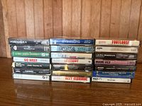 All 22 cassette tapes stacked two rows on shelf