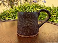 Side view showing glaze and handle