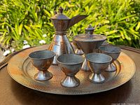 Full view of entire seven-piece coffee set on tray