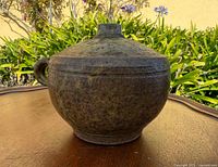 Front view showing handle, glaze and form