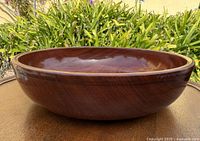 overall side view of bowl showing shape and grain