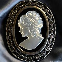 front view showing cameo and marcasite border