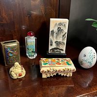 Front view all six decorative pieces on wood surface