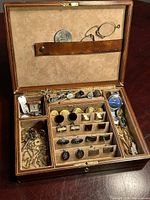 Open Birks jewellery box showing all contents