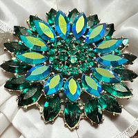 Front view of large teal layered rhinestone Weiss brooch
