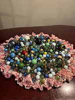 Full view of entire marble collection on doily