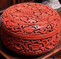 Top view showing carved floral lid detail