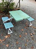 Table unfolded showing seats and top