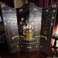 Front view of four-panel screen showing floral painting