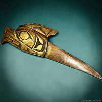 Overall view of carved wooden letter opener