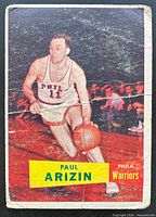 Front of 1957 Topps Paul Arizin card showing action image, creases and corner wear