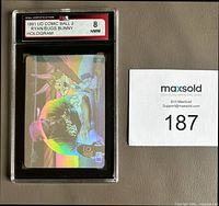 Front view of KSA-slabbed 1991 Upper Deck Comic Ball 2 Nolan Ryan/Bugs Bunny hologram card with grade 8 label visible