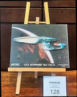 Front view of plaque on easel showing 3-D Star Trek image