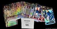 Spread of 2023-24 Tim Hortons Hockey cards displayed in a fan, MaxSold lot tag visible