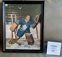 Full view of framed, autographed Johnny Bower color photo