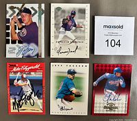 Fronts of five autographed Montreal Expos baseball cards