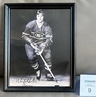 Full view of framed signed photograph