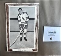 Front view of Beehive Group 3 Bob Nevin cardboard photo with lot card