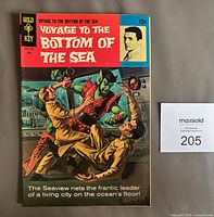 Front cover of Voyage to the Bottom of the Sea #14 showing artwork and price