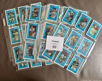 Front view of multiple binder pages showing fronts of 1982 Kellogg's 3-D cards