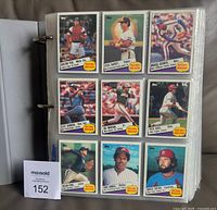 Binder page showing nine 1985 Topps baseball cards