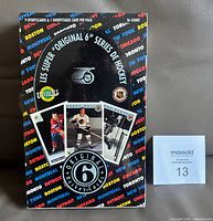 Front of sealed wax box showing branding, pack count, and graphics