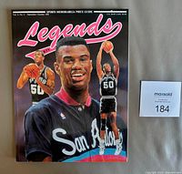 Front cover showing David Robinson illustration, issue details visible