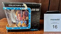 Front of boxed Star Trek collector's mug showing display window and graphics