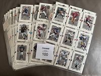 Front view of stacked binder pages showing multiple 1999 SP Authentic football cards