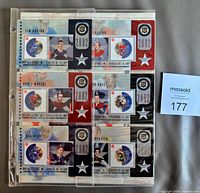front view of binder sheet showing six NHL All-Star stamp cards