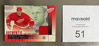 Front of 2002 Pacific Atomic Brett Hull card showing red jersey swatch and player imagery