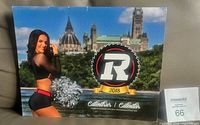 Front cover of 2018 Ottawa Redblacks Cheerleaders calendar showing team logo and cheerleader image