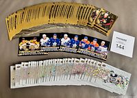 All 92 cards arranged: Pure Gold stack, four Franchise Trios cards, Above the Ice spread