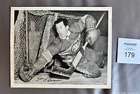 Front of 8"x10" black and white Bill Durnan photo showing action shot and autograph facsimile