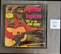 Front sleeve showing title, artist and shrink wrap condition