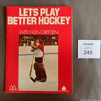 Front cover showing title, Ken Dryden photo, McDonald’s and Hockey Canada logos
