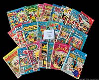 All 25 Archie digest comics fanned out on black background
