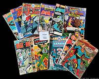 All 11 comics overlapped on black background